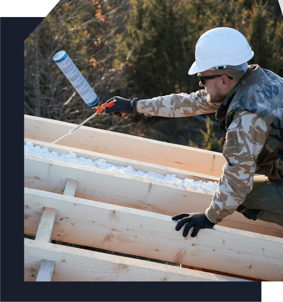 roofing contractor doing thermal insulation in a residential roof