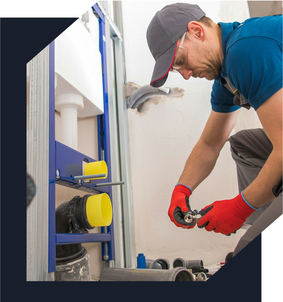 Plumber looking at tools to fix pipes